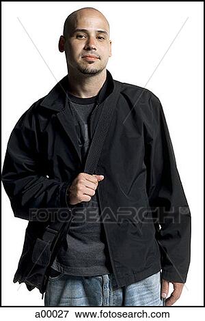 Portrait of a young man carrying a messenger bag View Large Photo Image Stock Photo - Portrait of a young man carrying a messenger bag. Fotosearch