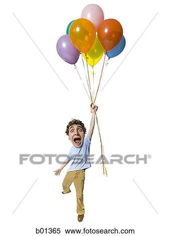 Portrait of a young man holding a bunch of balloons View Large Photo Image Stock Photography - Portrait of a young man holding a bunch of balloons. Fotosearch
