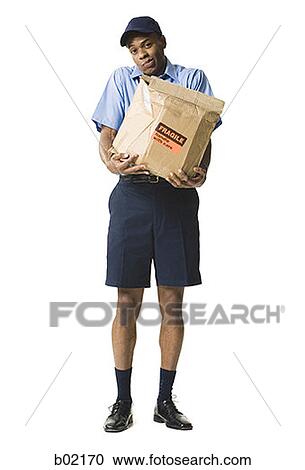 Portrait of a young man holding a damaged package View Large Photo Image Stock Image - Portrait of a young man holding a damaged package. Fotosearch