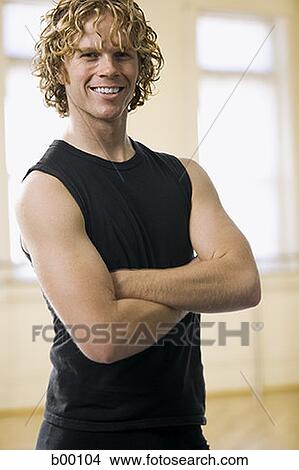 Portrait of a young man smiling View Large Photo Image Picture - Portrait of a young man smiling. Fotosearch