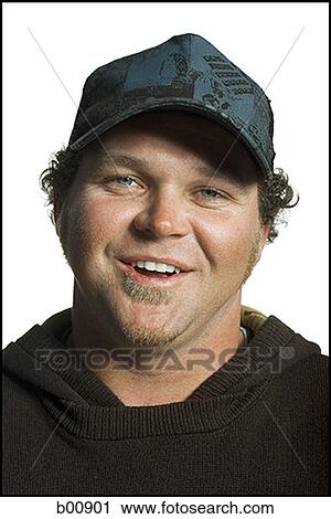 Portrait of a young man smiling View Large Photo Image Stock Image - Portrait of a young man smiling. Fotosearch