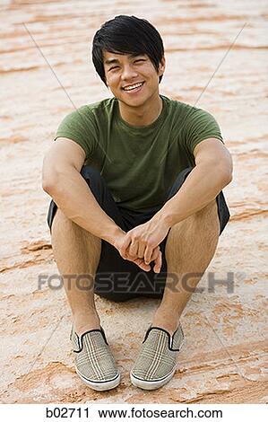 Portrait of a young man smiling View Large Photo Image Stock Image - Portrait of a young man smiling. Fotosearch