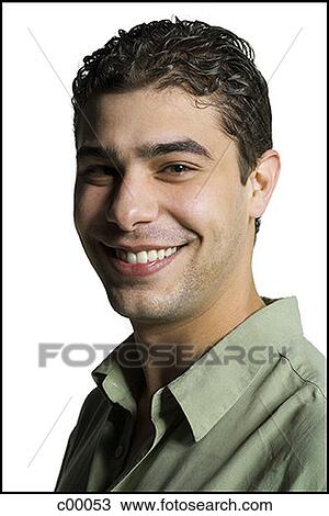 Portrait of a young man smiling View Large Photo Image Stock Image - Portrait of a young man smiling. Fotosearch