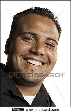 Stock Photograph - Portrait of a young man smiling. Fotosearch
