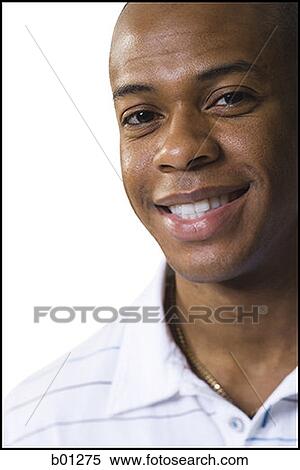 Stock Photography - Portrait of a young man smiling. Fotosearch