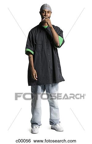 Portrait of a young man smoking View Large Photo Image Stock Photograph - Portrait of a young man smoking. Fotosearch