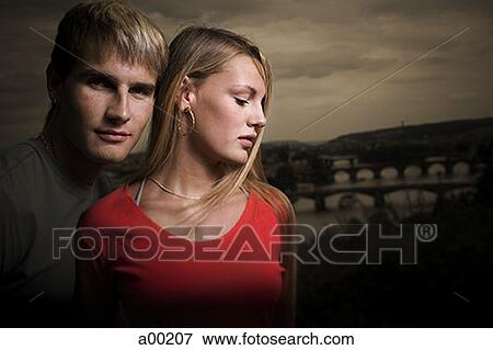 Portrait of a young man with a teenage girl View Large Photo Image Stock Photo - Portrait of a young man with a teenage girl. Fotosearch