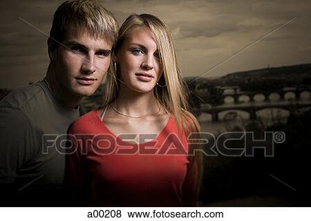 Portrait of a young man with a teenage girl View Large Photo Image Stock Photo - Portrait of a young man with a teenage girl. Fotosearch