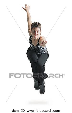 Portrait of a young woman dancing View Large Photo Image Stock Image - Portrait of a young woman dancing. Fotosearch