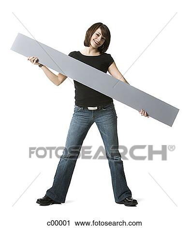 Portrait of a young woman holding a blank sign View Large Photo Image Stock Image - Portrait of a young woman holding a blank sign. Fotosearch