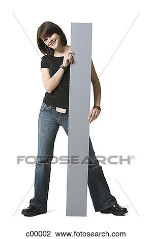 Portrait of a young woman holding a blank sign View Large Photo Image Stock Image - Portrait of a young woman holding a blank sign. Fotosearch