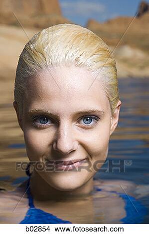 Portrait of a young woman in a lake View Large Photo Image Picture - Portrait of a young woman in a lake. Fotosearch