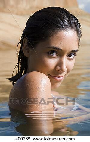 Portrait of a young woman in a lake View Large Photo Image Stock Photography - Portrait of a young woman in a lake. Fotosearch
