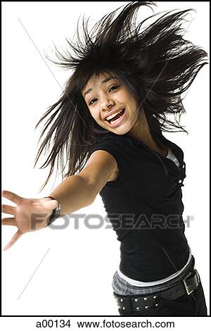 Portrait of a young woman in motion View Large Photo Image Picture - Portrait of a young woman in motion. Fotosearch