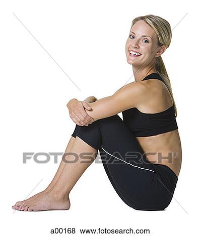 Portrait of a young woman in sports clothing View Large Photo Image Stock Photo - Portrait of a young woman in sports clothing. Fotosearch