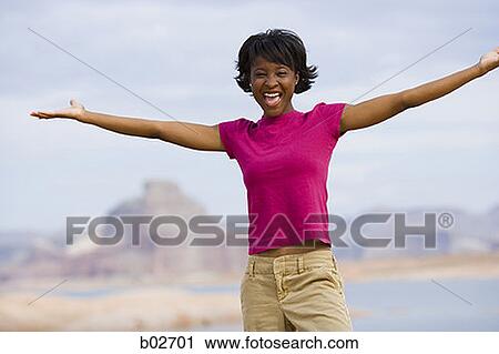 Portrait of a young woman laughing View Large Photo Image Stock Image - Portrait of a young woman laughing. Fotosearch