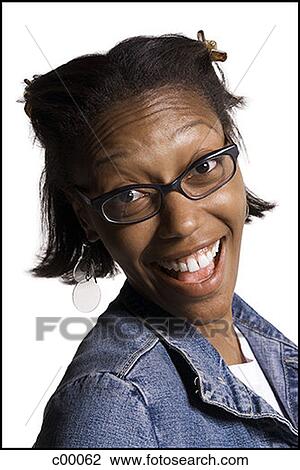 Portrait of a young woman laughing View Large Photo Image Stock Image - Portrait of a young woman laughing. Fotosearch