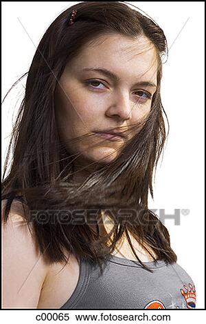 Stock Photography - Portrait of a young woman posing. Fotosearch