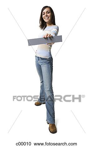 Portrait of a young woman showing a blank sign View Large Photo Image Stock Image - Portrait of a young woman showing a blank sign. Fotosearch