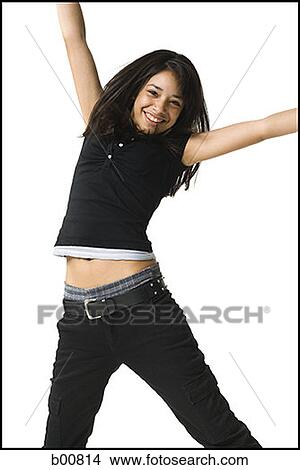 Portrait of a young woman smiling and jumping View Large Photo Image Picture - Portrait of a young woman smiling and jumping. Fotosearch