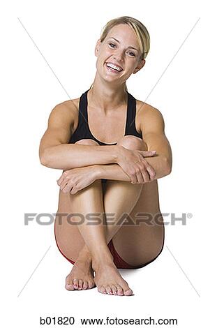 Portrait of a young woman smiling View Large Photo Image Stock Image - Portrait of a young woman smiling. Fotosearch