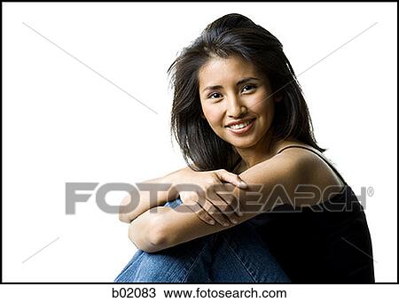 Portrait of a young woman smiling View Large Photo Image Stock Image - Portrait of a young woman smiling. Fotosearch