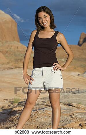 Stock Photo - Portrait of a young woman smiling. Fotosearch