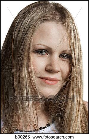 Portrait of a young woman smiling View Large Photo Image Stock Photography - Portrait of a young woman smiling. Fotosearch