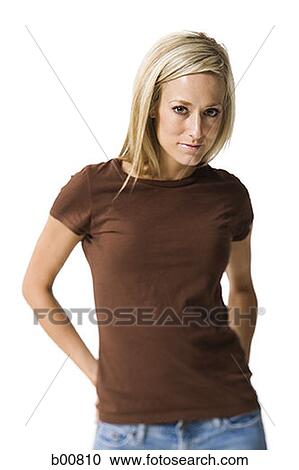 Portrait of a young woman standing View Large Photo Image Stock Image - Portrait of a young woman standing. Fotosearch
