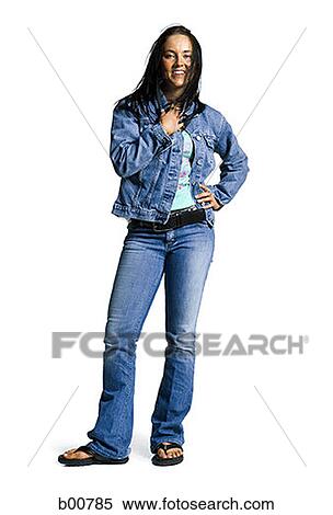Portrait of a young woman standing with her hand on her hip View Large Photo Image Stock Photography - Portrait of a young woman standing with her hand on her hip. Fotosearch