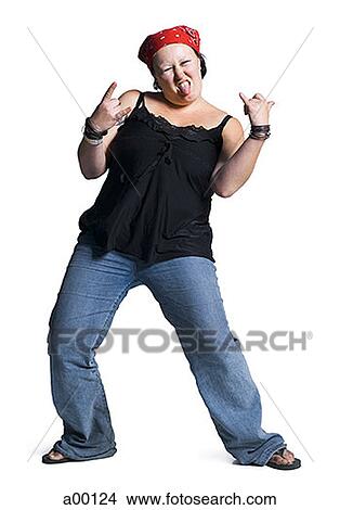 Portrait of a young woman sticking her tongue out View Large Photo Image Picture - Portrait of a young woman sticking her tongue out. Fotosearch
