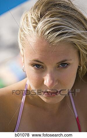 Portrait of a young woman View Large Photo Image Stock Photo - Portrait of a young woman. Fotosearch