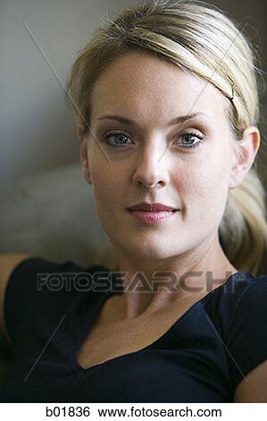 Portrait of a young woman View Large Photo Image Stock Photograph - Portrait of a young woman. Fotosearch