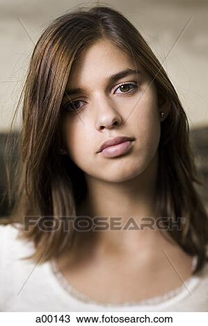 Portrait of a young woman thinking View Large Photo Image Stock Image - Portrait of a young woman thinking. Fotosearch