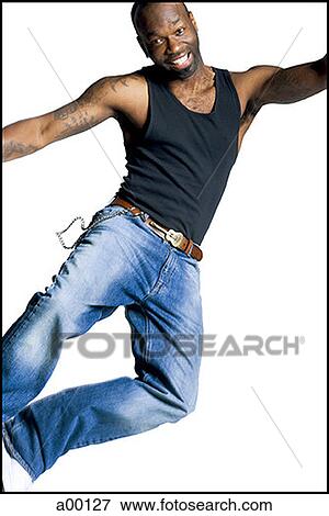 Stock Photo - Portrait of an adult man jumping. Fotosearch