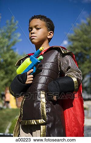 Portrait of an African-American boy in a costume View Large Photo Image Stock Image - Portrait of an African-American boy in a costume. Fotosearch