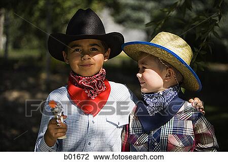 Portrait of two boys in cowboy costumes View Large Photo Image Stock Image - Portrait of two boys in cowboy costumes. Fotosearch