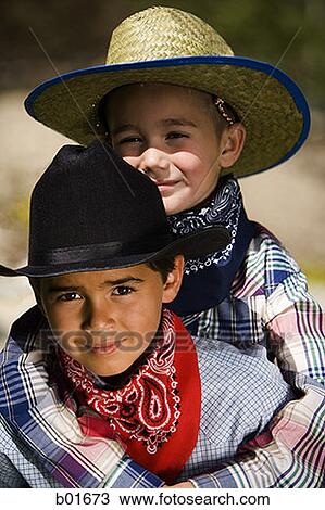 Portrait of two boys in cowboy costumes View Large Photo Image Stock Image - Portrait of two boys in cowboy costumes. Fotosearch
