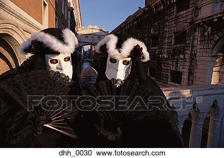 Portrait of two people in masquerade costumes View Large Photo Image Stock Image - Portrait of two people in masquerade costumes. Fotosearch