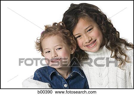 Portrait of two sisters smiling View Large Photo Image Stock Image - Portrait of two sisters smiling. Fotosearch