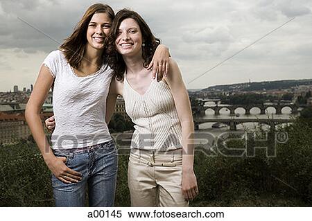 Portrait of two teenage girls smiling View Large Photo Image Stock Photography - Portrait of two teenage girls smiling. Fotosearch