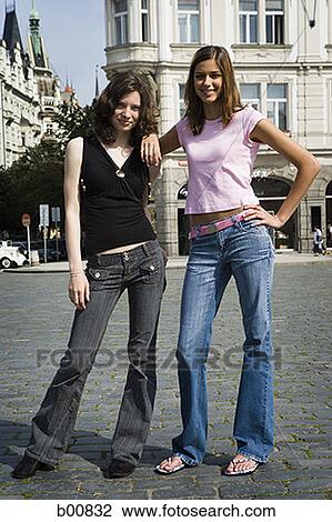 Portrait of two teenage girls standing View Large Photo Image Stock Image - Portrait of two teenage girls standing. Fotosearch