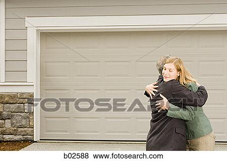 Profile of a businessman embracing a businesswoman View Large Photo Image Stock Photo - Profile of a businessman embracing a businesswoman. Fotosearch