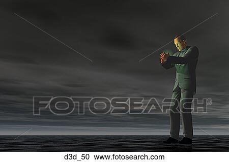 Stock Image - Profile of a businessman looking at something glowing in his hands. Fotosearch