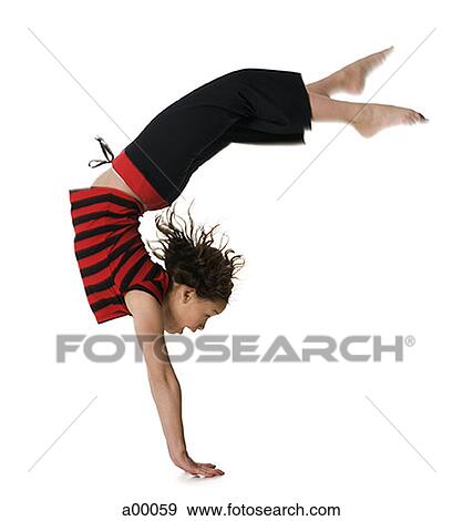 Profile of a girl doing a handstand View Large Photo Image Stock Photo - Profile of a girl doing a handstand. Fotosearch