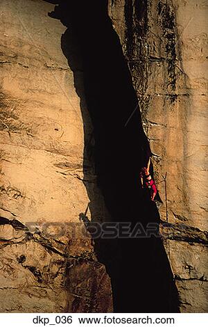 Profile of a man rock climbing View Large Photo Image Stock Photograph - Profile of a man rock climbing. Fotosearch