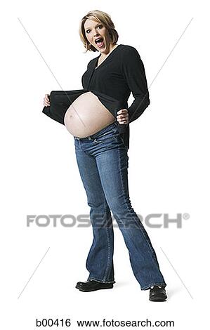 Profile of a pregnant woman showing her stomach View Large Photo Image Stock Photograph - Profile of a pregnant woman showing her stomach. Fotosearch