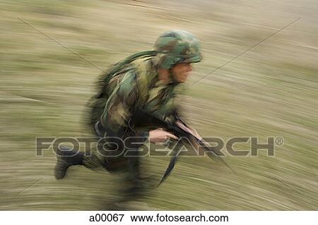 Profile of a soldier running View Large Photo Image Stock Photo - Profile of a soldier running. Fotosearch