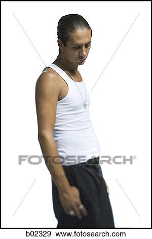Profile of a young man looking down View Large Photo Image Stock Photo - Profile of a young man looking down. Fotosearch