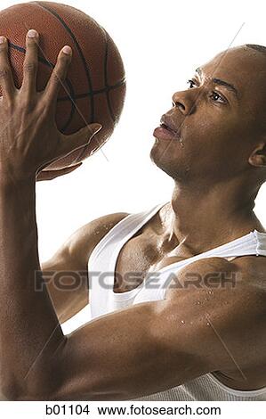 Profile of a young man playing basketball View Large Photo Image Picture - Profile of a young man playing basketball. Fotosearch